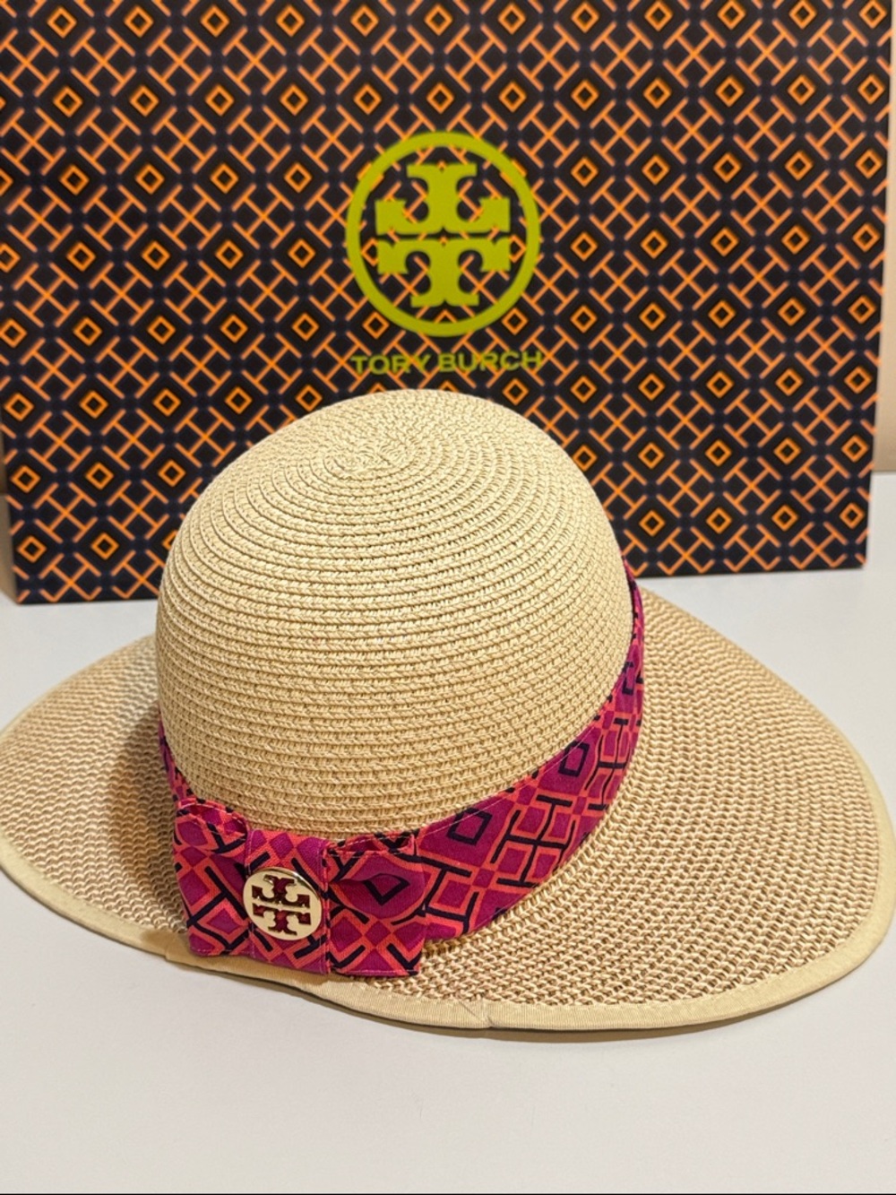 Stylish Hat Tan Sun with Pink Band Tory Burch and Goldtone charm logo UPF 50+